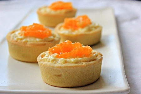 Фото к рецепту: Тартинки с рисовым пудингом и апельсинами