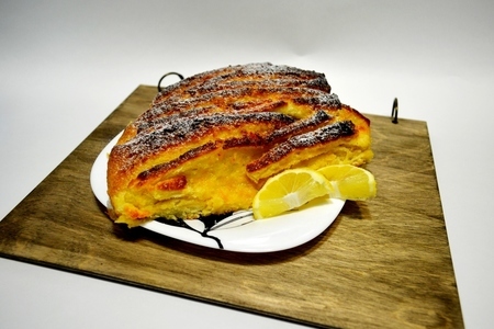 Фото к рецепту: Пирог "гармошка" с цедрой лимона и апельсина