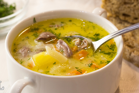 Фото к рецепту:  сырный суп с куриными сердечками!