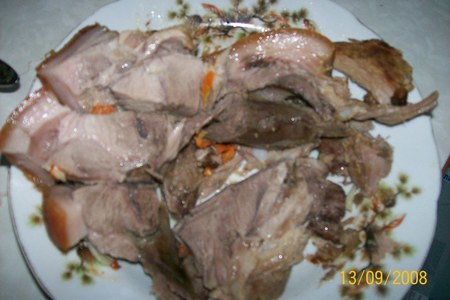 Фото к рецепту: Шпигованная свинина в "рукаве"