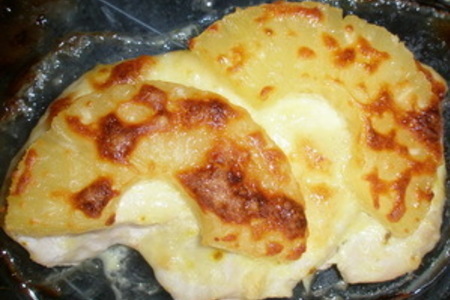 Фото к рецепту: Курица, запеченая с ананасами