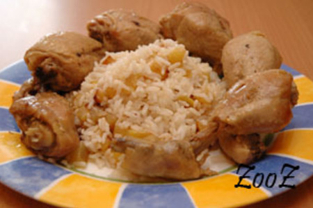 Фото к рецепту: Курочка с рисом и кабачками