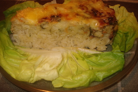 Фото к рецепту: Рисовый пирог с морским языком под сырной корочкой