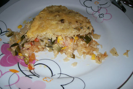 Фото к рецепту: Рис в духовке запеченный с овощами и сыром