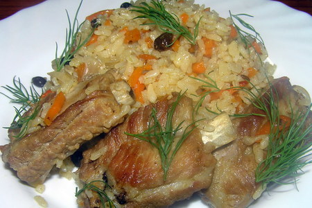 Фото к рецепту: Свиные ребрышки с рисом.