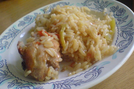 Фото к рецепту: Курица, тушенная с овощами и рисом