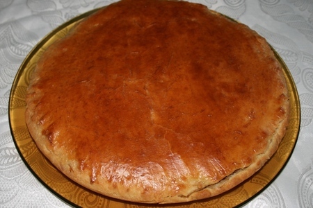 Фото к рецепту: Пирог с тушеной капустой