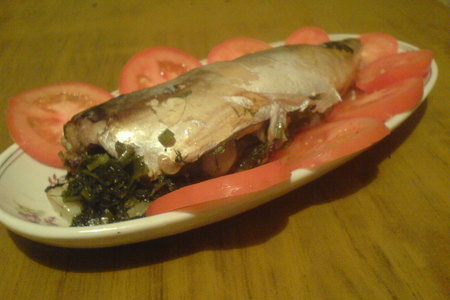 Фото к рецепту: Рыбка запеченая с зеленью в фольге