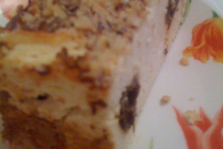 Фото к рецепту: Легкая творожная запеканка с мандаринами и черносливом под ореховой корочкой