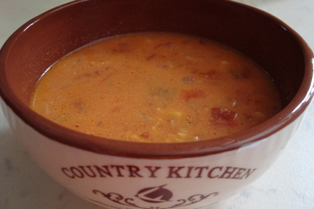 Фото к рецепту: Суп с помидорами, сыром и грибами