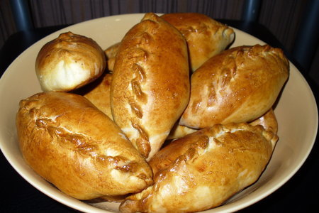 Фото к рецепту: Пирожки печеные с капустой и картошкой