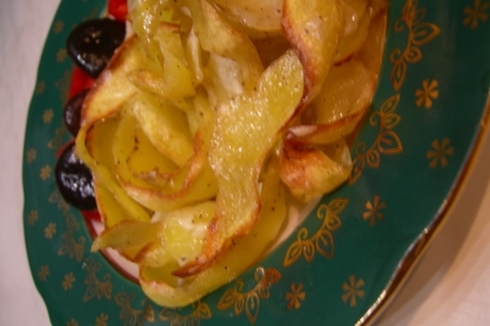 Фото к рецепту: Картофель запеченый "кучерявый"