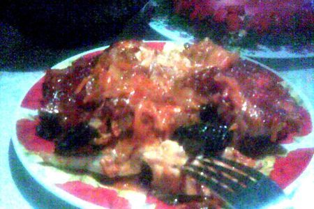 Фото к рецепту: Рыба под томатно-винным соусом с черносливом