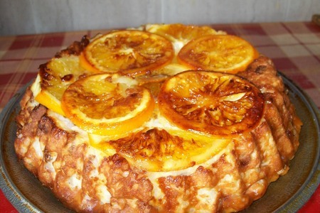 Фото к рецепту: Творожно-рисовая запеканка с изюмом и апельсином по рецепту кутовой ирины