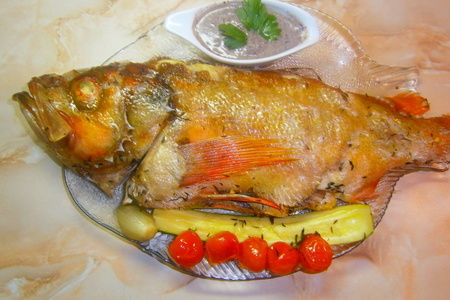 Фото к рецепту: Рыба люциан запеченная в травах