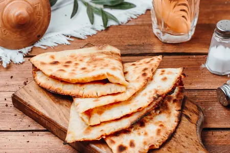 Лепешки на мангале: рецепт с пошаговыми инструкциями и секретами