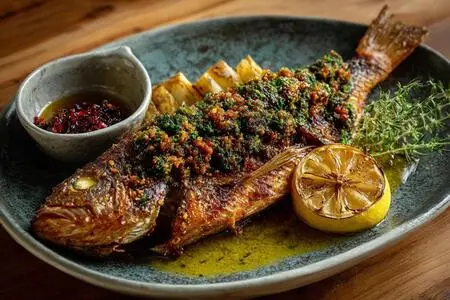 Целая рыба с золотистой корочкой и пикантным вкусом: секреты идеального приготовления