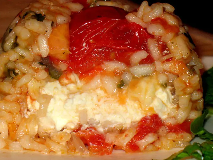 Рисовые тимбали с моцареллой(sformatini di riso alla mozzarella): шаг 9