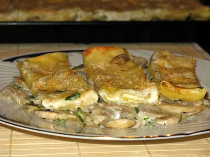 Рикотта-канноли, запечёные с грибами (cannoli di ricotta su gratin di funghi): шаг 7