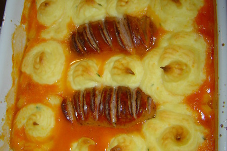 Картофельная запеканка с регенсбургскими колбасками(шпикачками) на капустной подстилке: шаг 2