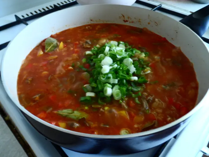 Рис с куриными сердечками и овощами.: шаг 7
