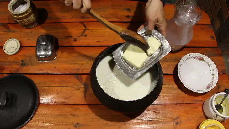 Пшенная каша на молоке с курагой, царская каша в печи: шаг 6