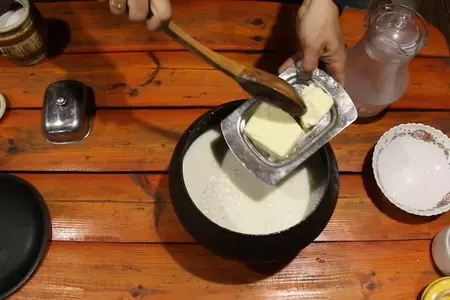 Пшенная каша на молоке с курагой, царская каша в печи: шаг 6