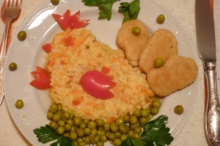 Фото к рецепту: Пшенная каша на гарнир с наггетсами из мяса цыплёнка "золотой петушок"
