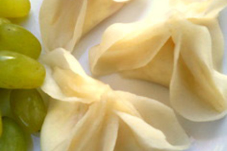 Фото к рецепту: Паровые пельмени "цветы лотоса".