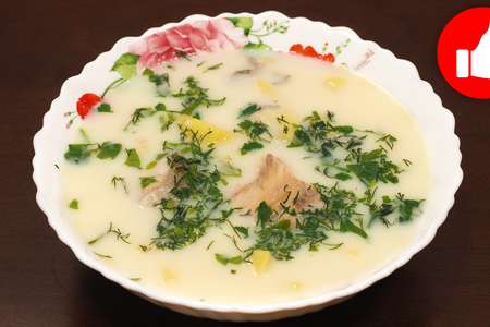 Фото к рецепту: Сырный суп с рыбой