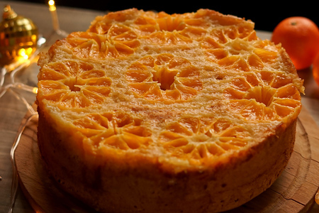 Фото к рецепту: Пирог с мандаринами 