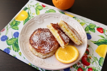 Фото к рецепту: Сырники с апельсином