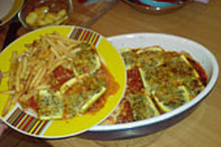 Фото к рецепту: Кабачки запечённые по-итальянски.
