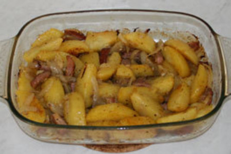 Фото к рецепту: Картошка с корейкой в духовке