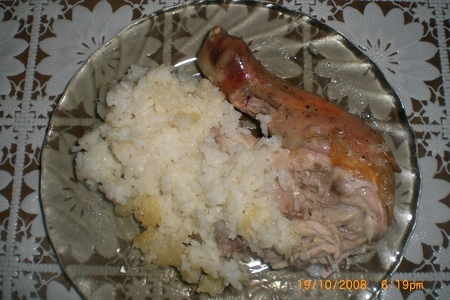 Фото к рецепту: Курица запеченная с рисом