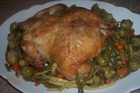 Фото к рецепту: Запеченая курица с овощами