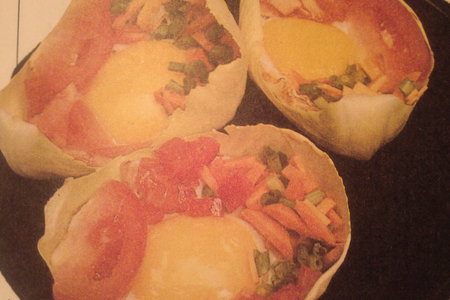 Фото к рецепту: Яйца в капустных листьях
