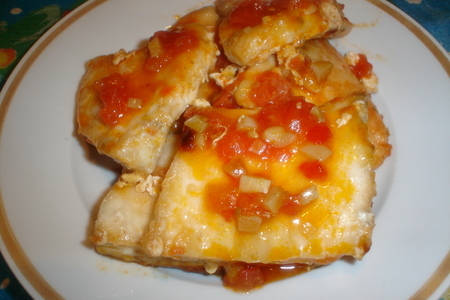 Фото к рецепту: Масляная рыба в томатно-чесночном соусе