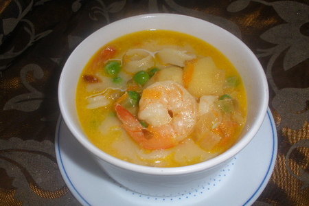 Фото к рецепту: Кремовый суп с морскими гадами