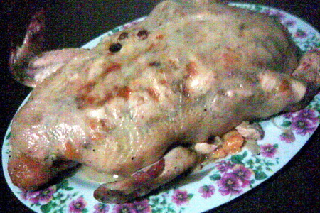 Фото к рецепту: Курица с капустой, изюмом и курагой (фаршированная, конечно)
